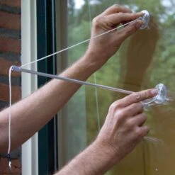 BirdSwing Window Peanut Cake Feeder -Nature Home Sales 35045 1